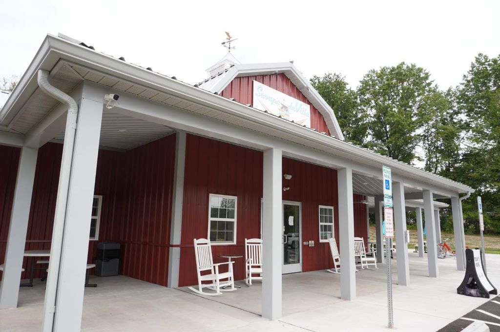 small commercial pole barn size project featuring traditional red and white barn color pattern